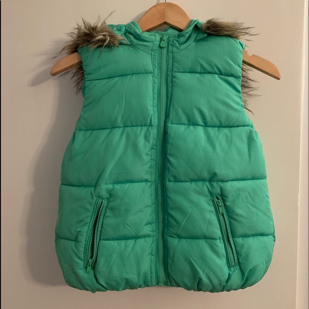 Green vest with faux fur hood